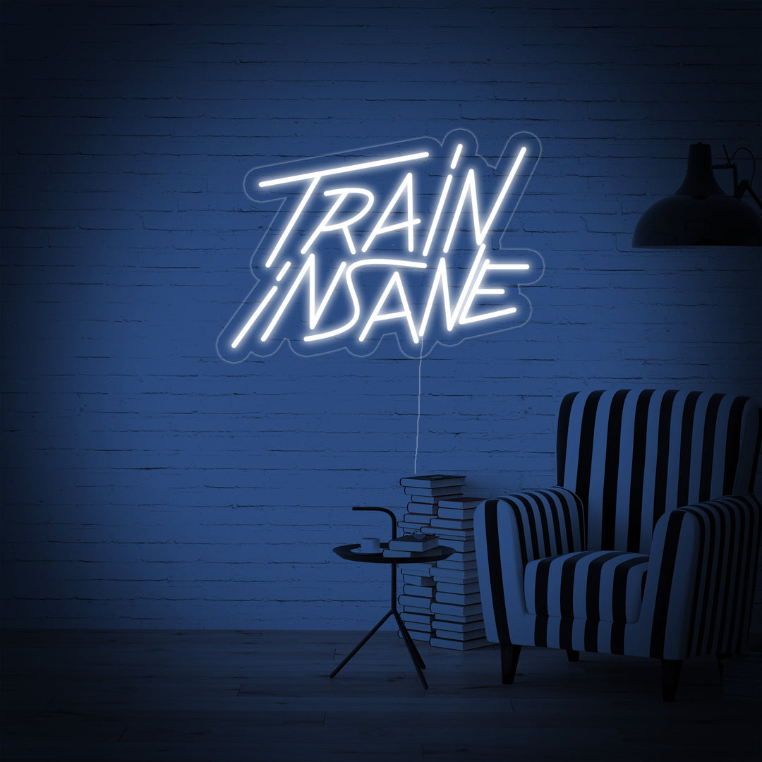 "Train Insane" Enseigne Lumineuse en Néon